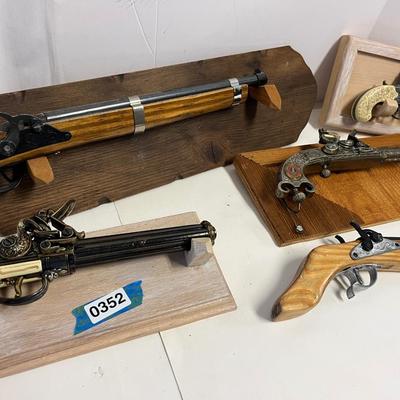 Replica Firearms and Mounts.