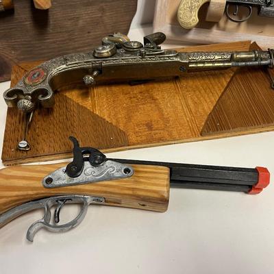 Replica Firearms and Mounts.