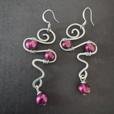 Dark Pink Glass Pearl Twisted Drop Earrings, characterized by their handmade, wire-wrapped design.