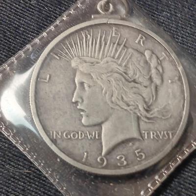 1935 PEACE SILVER DOLLAR WITH BAND TO USE AS PENDANT
