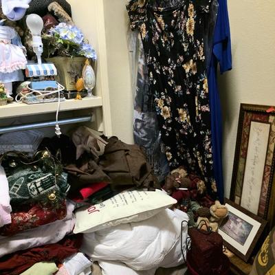 Sale Photo Thumbnail #61: Closet full of miscellaneous items including decor, florals, linens including a blue and yellow quilted daybed comforter set.