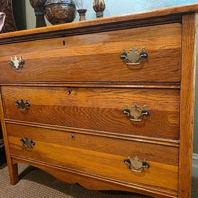 1 nightstand with 4 tabletop decor pieces.