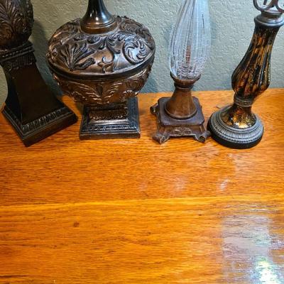1 nightstand with 4 tabletop decor pieces.