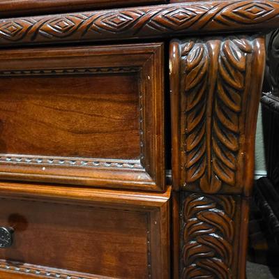 Sale Photo Thumbnail #86: King sleigh bed frame with headboard and footboard, 1 nightstand, and hanging wall shelf. Does not include mattress or bedding. `The matching 3 drawer nightstand measures 28.5"H x 30"W x 20"D. Does not include lamp. Lamps are in lot 17SS.