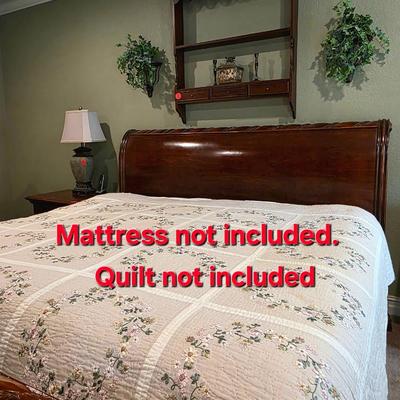 Sale Photo Thumbnail #83: King sleigh bed frame with headboard and footboard, 1 nightstand, and hanging wall shelf. Does not include mattress or bedding. `The matching 3 drawer nightstand measures 28.5"H x 30"W x 20"D. Does not include lamp. Lamps are in lot 17SS.