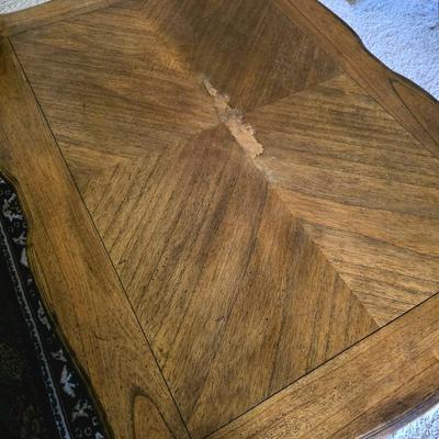 Sale Photo Thumbnail #134: Rectangle wood coffee table with area rug. Please see picture for defect on top of coffee table. Table measures 50"L x 36"W x 17.5"H.
Rug measures 4ft x 5ft.