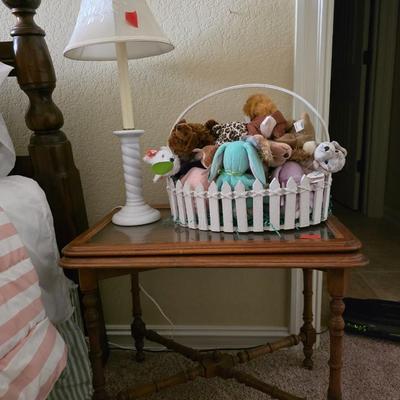 Sale Photo Thumbnail #145: Queen bed including headboard, footboard, mattress and bedding with pull out sofa bed and side table, lamp and basket of beanie babies