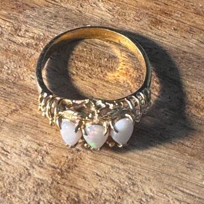 Three-stone opal ring