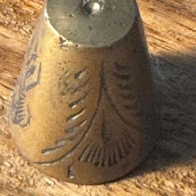 Vintage brass thimble,