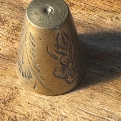Vintage brass thimble,