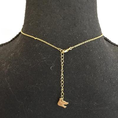 Super cute, dainty, very nice gold toned ladybug, flower necklace. Very nice quality.