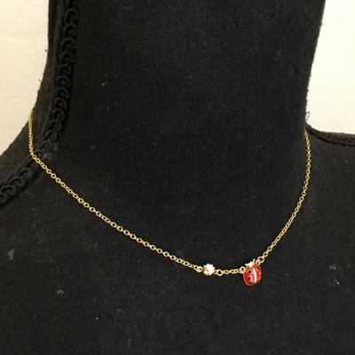 Super cute, dainty, very nice gold toned ladybug, flower necklace. Very nice quality.