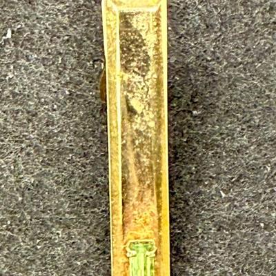 Sale Photo Thumbnail #324: Nice stone and shiny gold tone finish.