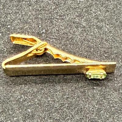 Sale Photo Thumbnail #323: Nice stone and shiny gold tone finish.