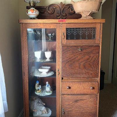 Vintage Oak Side by Side/Secretary Cabinet with vintage decor items.