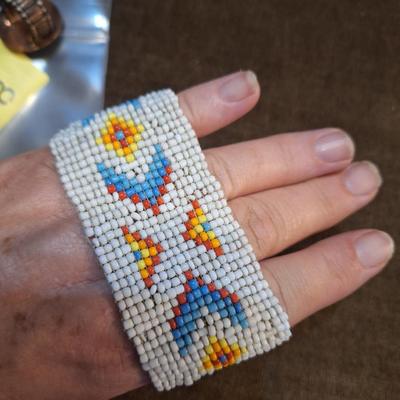 Sale Photo Thumbnail #83: small seed bead bracelet and stretch ring.