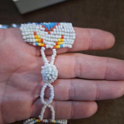 Sale Photo Thumbnail #82: small seed bead bracelet and stretch ring.