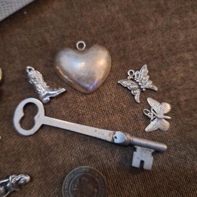 Sale Photo Thumbnail #93: misc charms and skeleton key