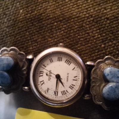 Sale Photo Thumbnail #115: the band is sterling and leather, the watch needs a new battery and is untested.  Not sure if the stones are turquoise or other stone.