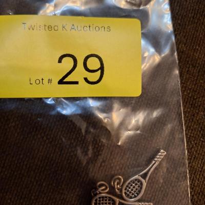 Sale Photo Thumbnail #138: these look a lot like a James avery charm and they were on a James avery bracelet but these two charms didn't have the James avery marking only the sterling mark.  So they were separated from the rest of the bracelet (already sold in previous auction)