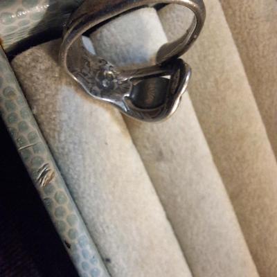 Sale Photo Thumbnail #145: see all photos.  Stone has scratches on it and ring isn't round.
