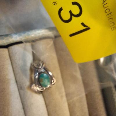 Sale Photo Thumbnail #146: see all photos.  Stone has scratches on it and ring isn't round.
