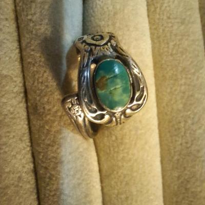 Sale Photo Thumbnail #147: see all photos.  Stone has scratches on it and ring isn't round.