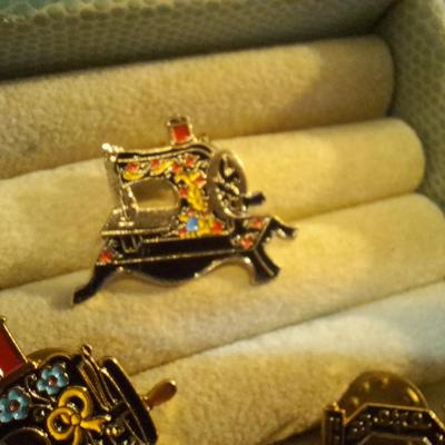 Sale Photo Thumbnail #237: Sewing machine brooches- vintage machines