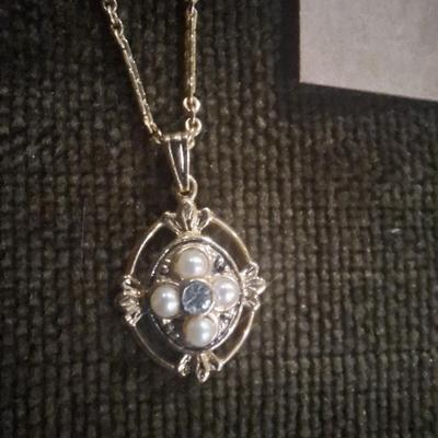 necklaces, earrings and pin