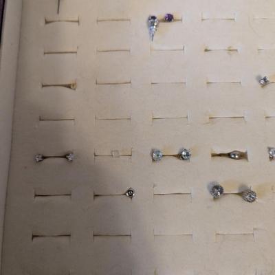 Box of studded earrings
