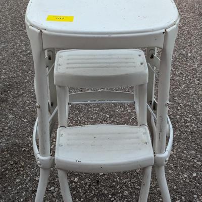 Vintage step stool with pull out steps