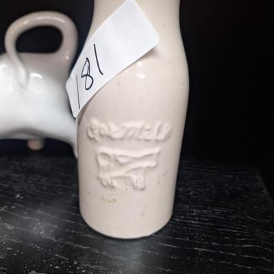 cow creamer and milk bottle