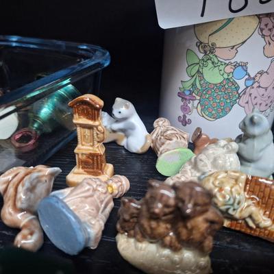 miniatures and a coffee cup