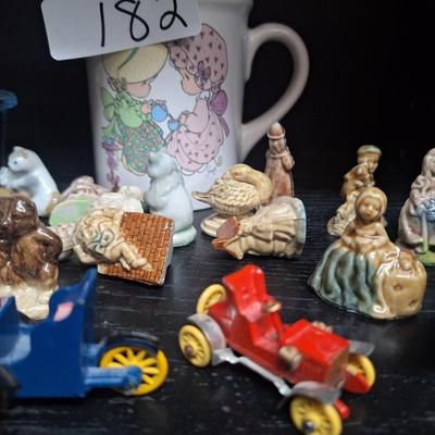 miniatures and a coffee cup