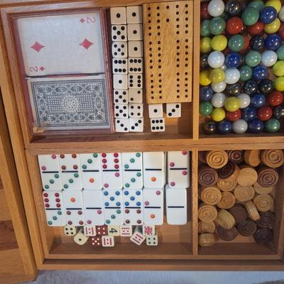 Game bundle-checkers, dominos cards and other items stored inside board piece