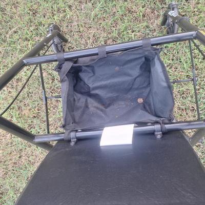 walker with seat and brakes