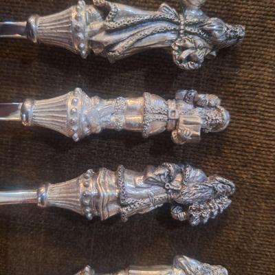 Collectible santa spoons and a fork 