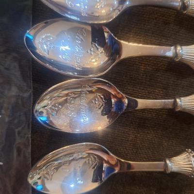 Collectible santa spoons and a fork 