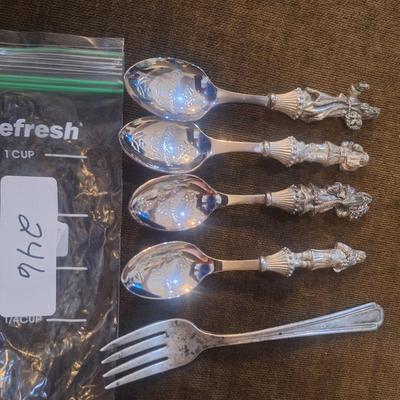 Collectible santa spoons and a fork 