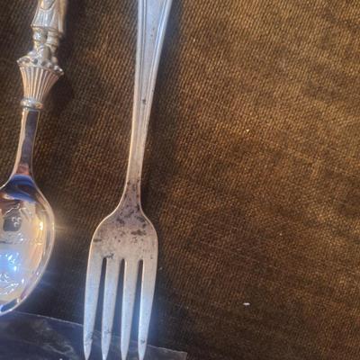 Collectible santa spoons and a fork 