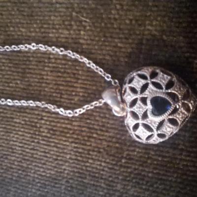 Vintage sterling silver heart pendant from Avon