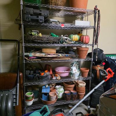 Wire Shelf with Miscellaneous Planters, Seasonal Decor and Seasonal Yard Tools