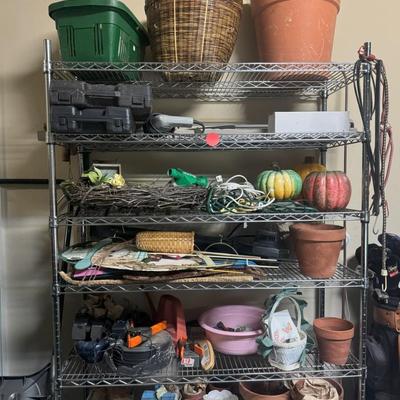 Wire Shelf with Miscellaneous Planters, Seasonal Decor and Seasonal Yard Tools