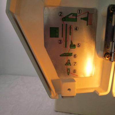 Sale Photo Thumbnail #4: In excellent condition, Model DX2015, tested & works, has 17 different stitches & button hole, has extra sewing needles, includes case