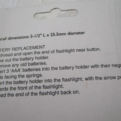 Sale Photo Thumbnail #28: Nine LED bulb flashlight, black