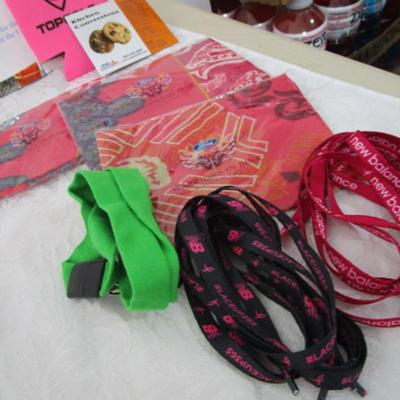 Sale Photo Thumbnail #240: Basket with 2 brand new t-shirts, 1-L, 1-XL, key chains, stickers, scarves, nail files, pens, pencils, beach ball, pins, shoe strings, and more