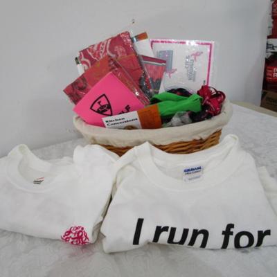 Sale Photo Thumbnail #227: Basket with 2 brand new t-shirts, 1-L, 1-XL, key chains, stickers, scarves, nail files, pens, pencils, beach ball, pins, shoe strings, and more
