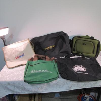 Sale Photo Thumbnail #491: 1 is a duffle bag is 11" deep x 22" long x 11" tall ; New Utah State Employees Charitable Fund bag is 15" x 18", New Shopa bag is 12-1/4" x 14" tall x 3-5/8" deep; New Scout Parents courier bag is 14" wide x 13-3/4" tall x 3" deep, US Traveler bag is 13" 