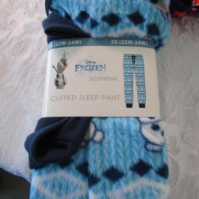 Sale Photo Thumbnail #498: Disney sleep pants 3X (22W-24W) and LuLa Roe leggings no size, but waist measures 36".  Also Cozy Critter slipper socks