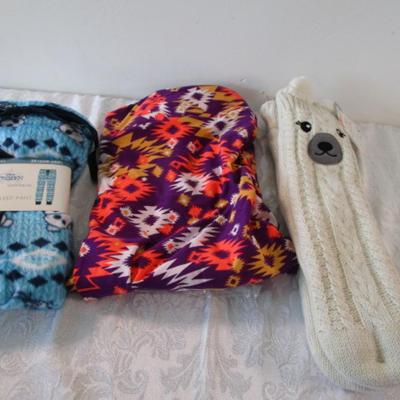 Sale Photo Thumbnail #497: Disney sleep pants 3X (22W-24W) and LuLa Roe leggings no size, but waist measures 36".  Also Cozy Critter slipper socks